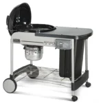 תמונה של גריל פחם 57 ס"מ שחור  כולל שולחן - וובר WEBER PERFORMER DELUXE - מרכז החימום